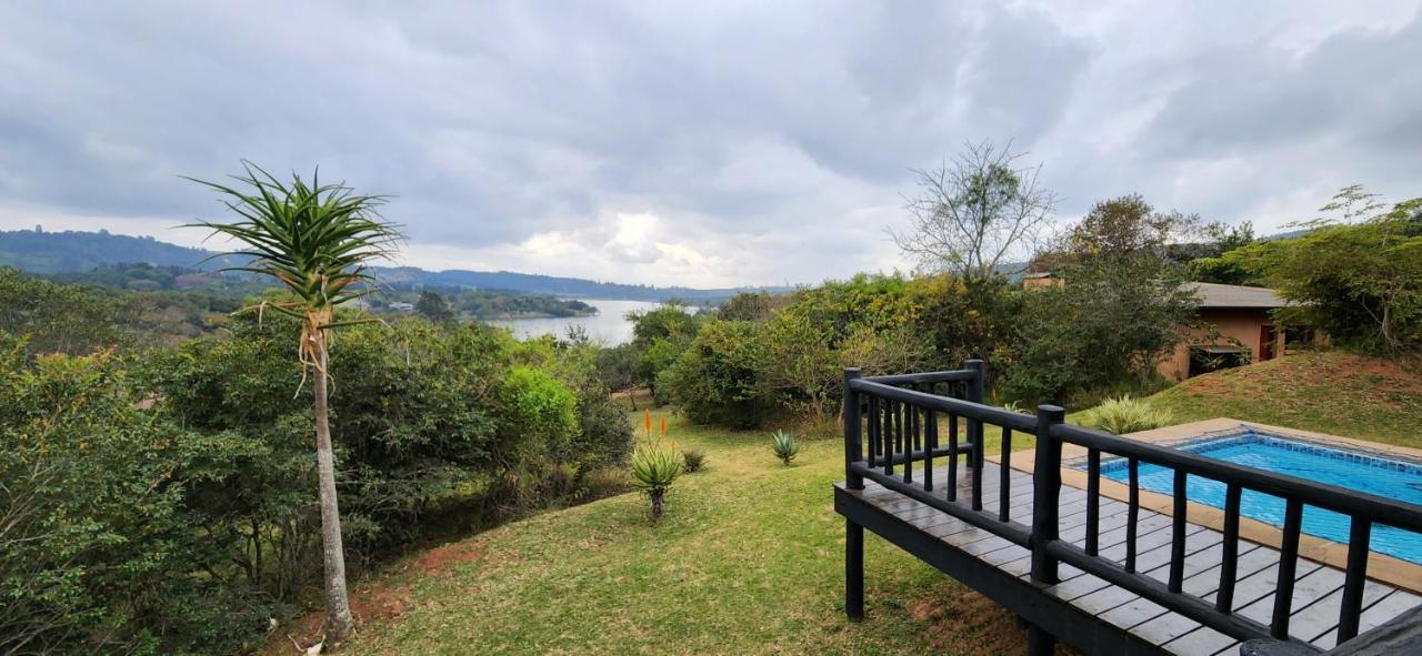 Da Gama Lake Cottages - Coral Tree And Cormorant Cottages White River Bagian luar foto